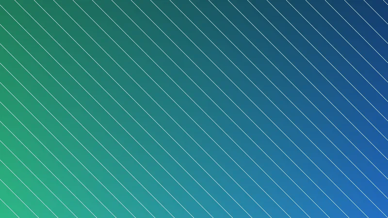 Vista noturna da Torre Agbar iluminada com LEDs coloridos em Barcelona